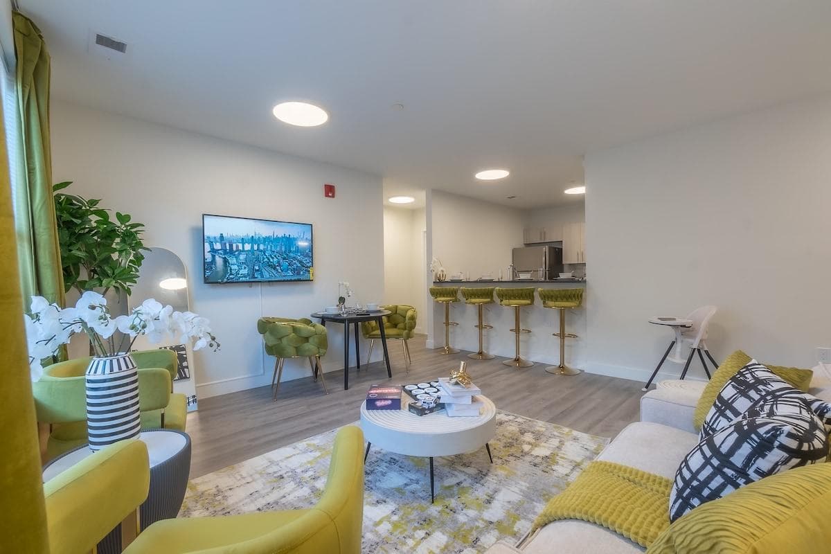 Sit back and enjoy streaming your favorite shows or movies on the comfy sofa and plush velvet chairs 